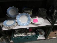 2 shelves of assorted plates, some a/f.