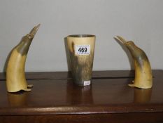 A horn beaker and 2 horn penguins.