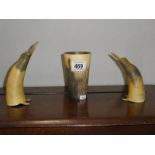 A horn beaker and 2 horn penguins.