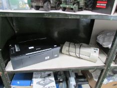 An Epson printer and a laminator.
