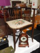 A mahogany inlaid corner chair.