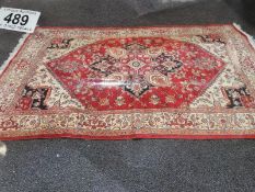 A red patterned rug.