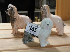 A Poole Pottery Old English Sheep dog and 2 Afghan hounds.