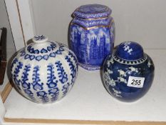 3 blue and white ginger jars.