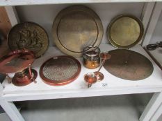 A shelf of brass and copper.