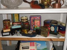 A shelf of old tins.