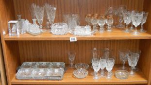 2 shelves of glass ware.