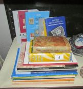 A quantity of philatelic books including auction catalogues, Stanley Gibbons catalogues etc.