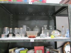 A mixed lot of glass ware, one shelf.