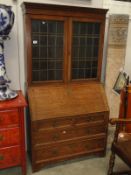 An oak bureau book case.