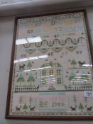 A modern framed and glazed sampler.