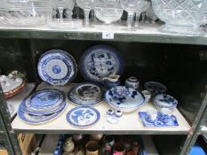 A mixed lot of blue and white china ware, one shelf.