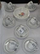A quantity of monogrammed coffee cups and saucers etc.