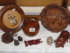 A wooden tobacco jar, plaques, pigs etc.