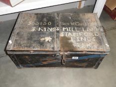 An old tin trunk marked 563140 Sgt. W. Gulliver.