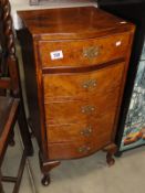 A small walnut 5 drawer chest.