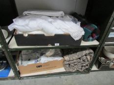 2 shelves of linen, blankets, quilt etc.