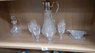 A claret jug, glasses etc.