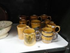 10 assorted ceramic tankards including Wade, Britannia,