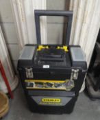 A Stanley mobile work centre with a few tools and fixings (screws,