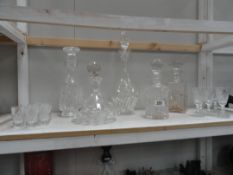 5 crystal glass decanters and a set of 6 glasses and 6 shot glasses