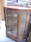 A mid-20th C china cabinet