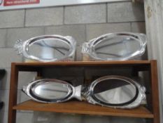 4 boxed WMF sliver plate serving platters in form of fish, cow,