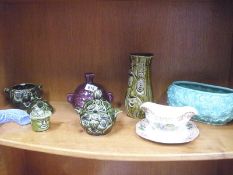 A shelf of Sadler and Sylvac items and other pottery