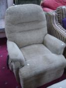 A good quality electric reclining armchair