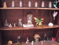 A collection of fairy and angel figurines