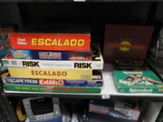 A collection of games and vintage games including Escalado x 2, Colditz,
