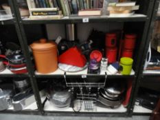 Two shelves of kitchen items and pans etc