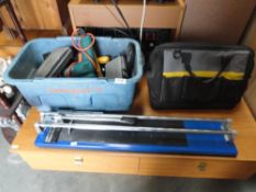 A box and a bag of hand tools including socket sets, power drill, spirit level,