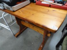 A pine kitchen table