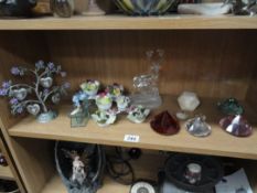 A shelf of posies ornaments,