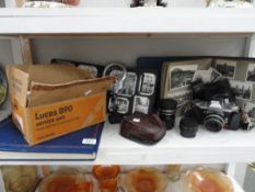 A quantity of cameras, accessories,