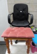 An office chair and a small stool