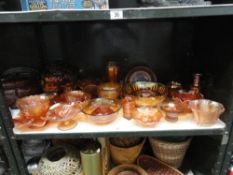 A collection of approximately 25 pieces of assorted Carnival Glass