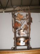 A metal wire umbrella stand