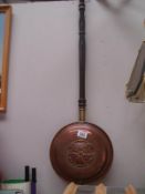 A copper warming pan