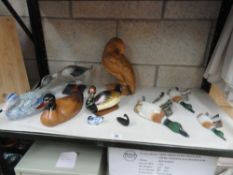 A collection of duck figurines