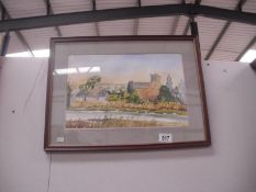 A framed and glazed watercolour of a Riverside Rural Church