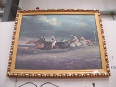 A framed print of a vintage horse racing scene