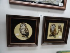 Two framed ceramic tiles featuring owls