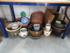 A large quantity of plant pots etc