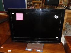 A Sanyo HD TV with remote control