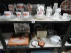 Two shelves of pottery including German tea set, Avocado dishes,