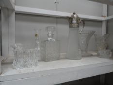 A collection of crystal and glass including decanters and vases