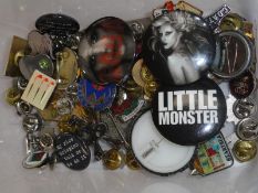 A collection of interesting pin badges and badges