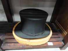 A bowler hat in its original box